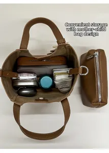 Internal view of brown bucket bag showing high storage capacity for daily essentials