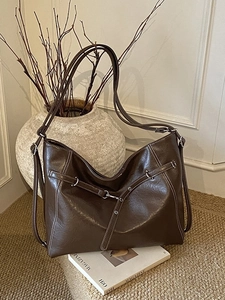 Retro dark brown PU leather tote bag with contrast stitching and silver hardware details