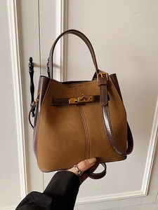 Brown suede patchwork bucket bag with gold lock and adjustable shoulder strap for women