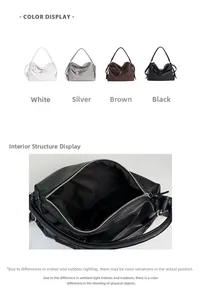 Detailed view of large PU leather tote bag with metallic zippers and textured finish