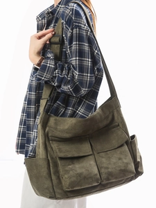 Retro utility canvas shoulder bag in olive green with multi-pockets and wide strap