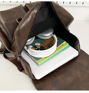 Detail view of large capacity dark brown vintage backpack with laptop storage compartment