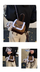 Detail of mini backpack with faux fur trim, vintage pattern, and cute rabbit charm