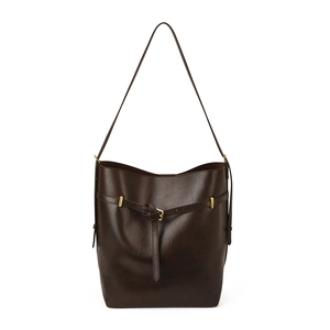 Minimalist large brown bucket shoulder bag with vintage glossy texture and gold buckle