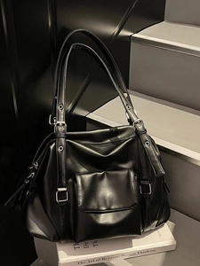 Retro black oversized tote bag with adjustable multi-straps and soft leather finish
