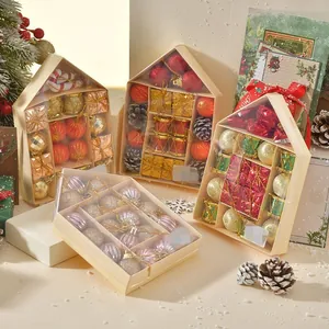 Detail of Christmas ornament gift boxes featuring assorted festive baubles and decor
