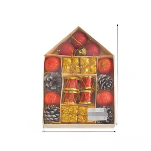 Close-up of Christmas ornaments set including red balls and pine cones in 17x12cm box