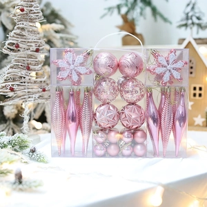 Detailed set of 40 pink Christmas ornaments in a clear gift box with various textures