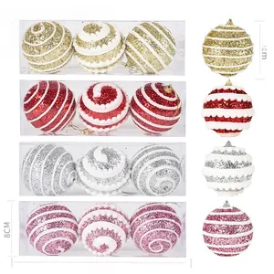 Detail of 8cm Christmas foam ornaments with sequins and white plush wavy trim in a 3-pack box