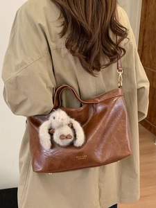 Retro dark brown large capacity faux leather tote bag with a plush rabbit pendant