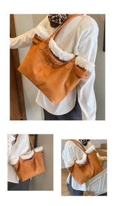 Detail of orange suede tote bag with white faux fur trim and decorative leather buckle