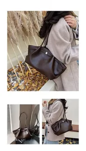 Détails du sac fourre-tout marron foncé plissé avec fines lanières et boucle en métal
