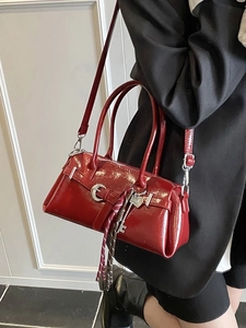 Chic dark red glossy baguette bag with silver belt buckle and silk scarf decoration