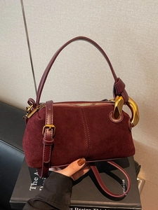 Burgundy suede and leather Boston bag with vintage gold hardware and chain detail
