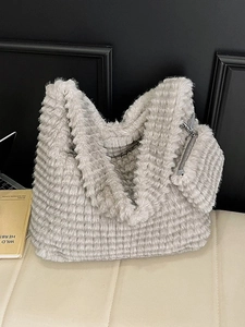 Large grey faux fur tote bag with horizontal plush texture and matching mini pouch
