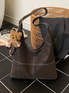 Retro coffee brown tote bag with contrast stitching and cute plush bear charm