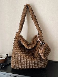 Brown plush tote bag with embossed checkered texture and matching small pouch