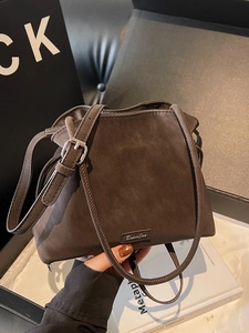 Retro dark brown bucket bag with matte finish and fine shoulder strap for women