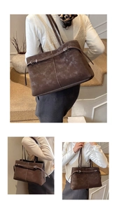 Detailed view of dark brown suede tote bag with silver metal buckles and contrast stitching