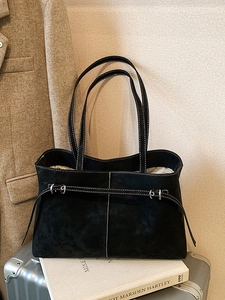 Vintage black suede tote bag with white contrast stitching and silver metal buckles