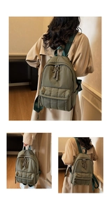Détail du sac à dos matelassé vert armée avec tirettes de fermeture éclair tissées