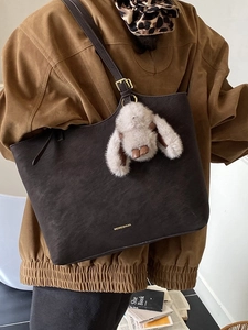 Vintage brown leather tote bag with rabbit charm for women's casual shoulder commuting