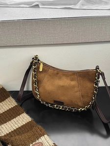 Retro brown suede crescent shoulder bag with golden chain and sleek leather strap