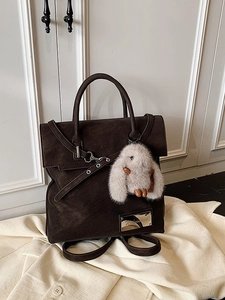 Retro dark brown large capacity faux leather backpack with a cute plush rabbit charm