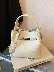 Retro cream litchi texture leather bucket bag with silver twist lock and shoulder strap