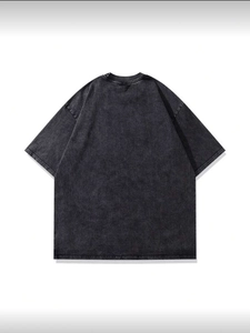 Detailed back view of vintage acid wash oversized t-shirt in distressed dark grey finish