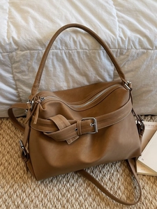 Brown vintage large capacity faux leather tote bag with knotted strap detail and silver hardware