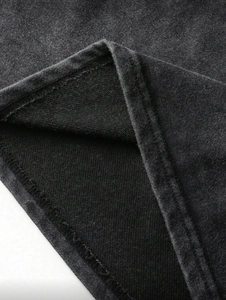 Detail of vintage washed charcoal cotton fabric with premium double-needle hem stitching