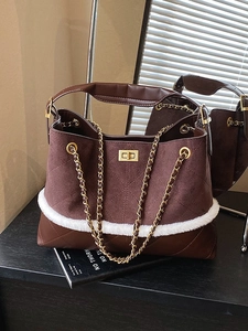 Vintage brown suede tote bag with quilted leather, faux fur trim, and golden chain strap