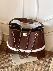 Retro brown suede tote bag with quilted pattern, plush trim and gold chain strap