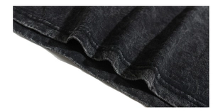 Detail of double-needle stitching on heavy washed cotton vintage oversized t-shirt