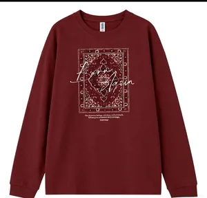 Detail of vintage burgundy cotton T-shirt featuring Born Again graphic print