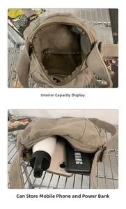 Detail of khaki canvas messenger bag interior with zippered compartment and storage space