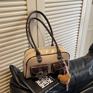 Retro beige and brown contrast leather Boston tote bag with dual front pockets and bear charm