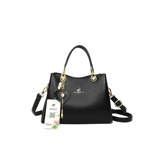 Classic black leather handbag for women featuring gold kangaroo logo and detachable strap