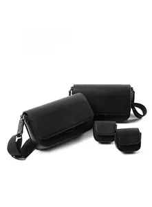 Set of black cross-grain PU leather messenger bags and matching small earphone pouches