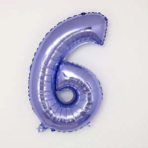 Detailed view of number 6 purple foil balloon with shiny metallic finish for party decor