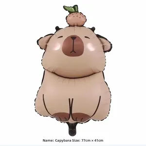 Detail view of 77x41cm Capybara foil balloon with orange on head for party decor