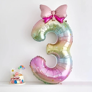 Rainbow gradient number 3 balloon with stars and pink bow for birthday party decoration
