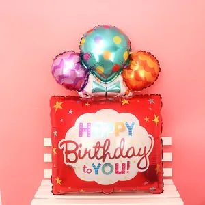 Large red gift box foil balloon with colorful patterns for birthday party decoration