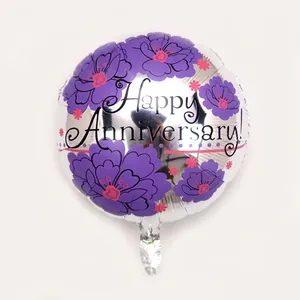 Detail of 18 inch silver foil Happy Anniversary balloon with floral pattern and valve