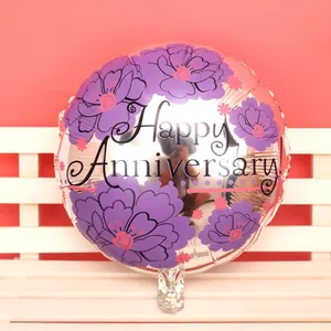 18 inch silver foil balloon with purple floral patterns and Happy Anniversary text