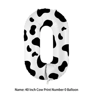 Detail of 40 inch number 0 balloon with cow print pattern for party decorations