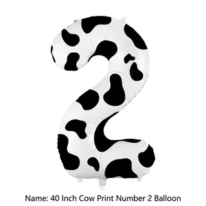 Detail of a 40 inch number 2 balloon with realistic black and white cow print texture