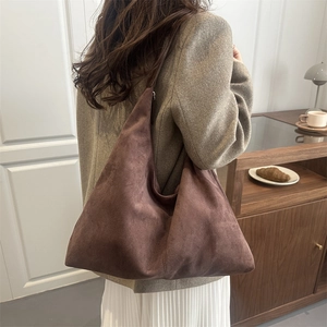 Vintage dark brown large hobo shoulder bag in soft suede for minimalist autumn style