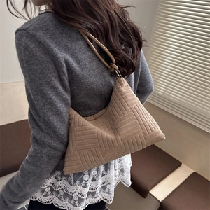 Retro khaki nylon tote bag with geometric quilting and slim shoulder straps